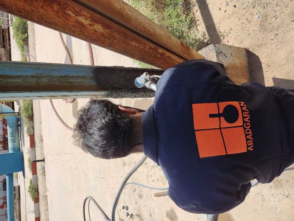 Spraying Cementitious Fire-Resistant Coating